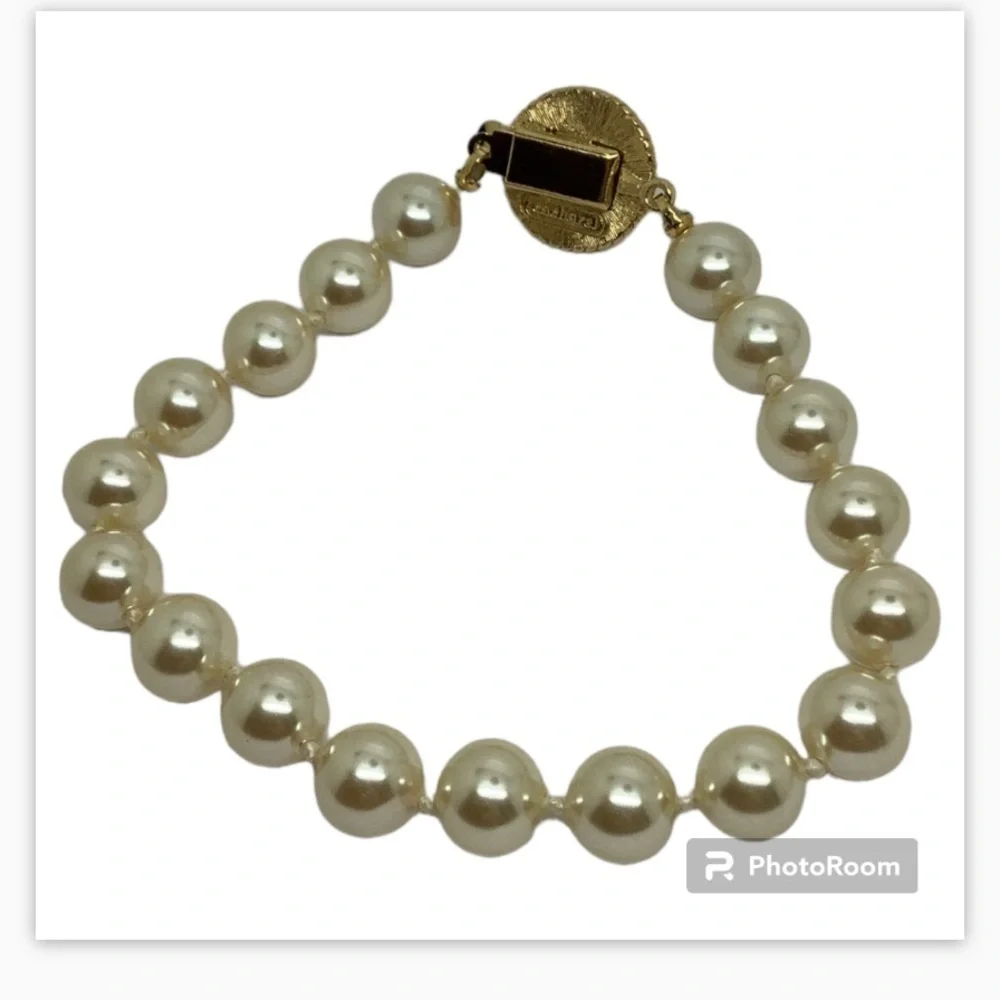 Cacharel Gold tone faux pearl 7” bracelet
